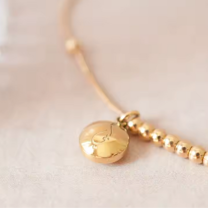 Bracelet Sœur "Oukhti" - Gravure Arabe & Perles Dorées